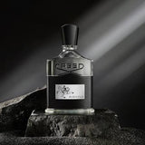 Gucci Guilty perfume bottle on a dark background