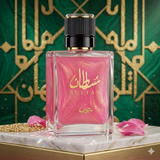 Perfume bottle labeled 'Sultan' with pink design on a decorative background